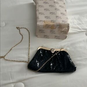 Vintage 1985 whiting and Davis Elegant Black Clutch
